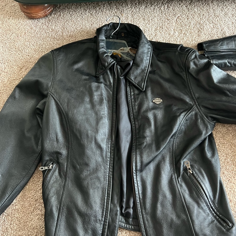 Two Harley coats say xl fits more like large 150 each